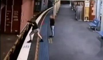  Woman survives after jumping on a moving train & being run over